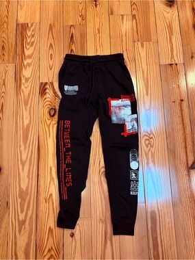 TAG Elemental Black Joggers with Red & White Graphic Details